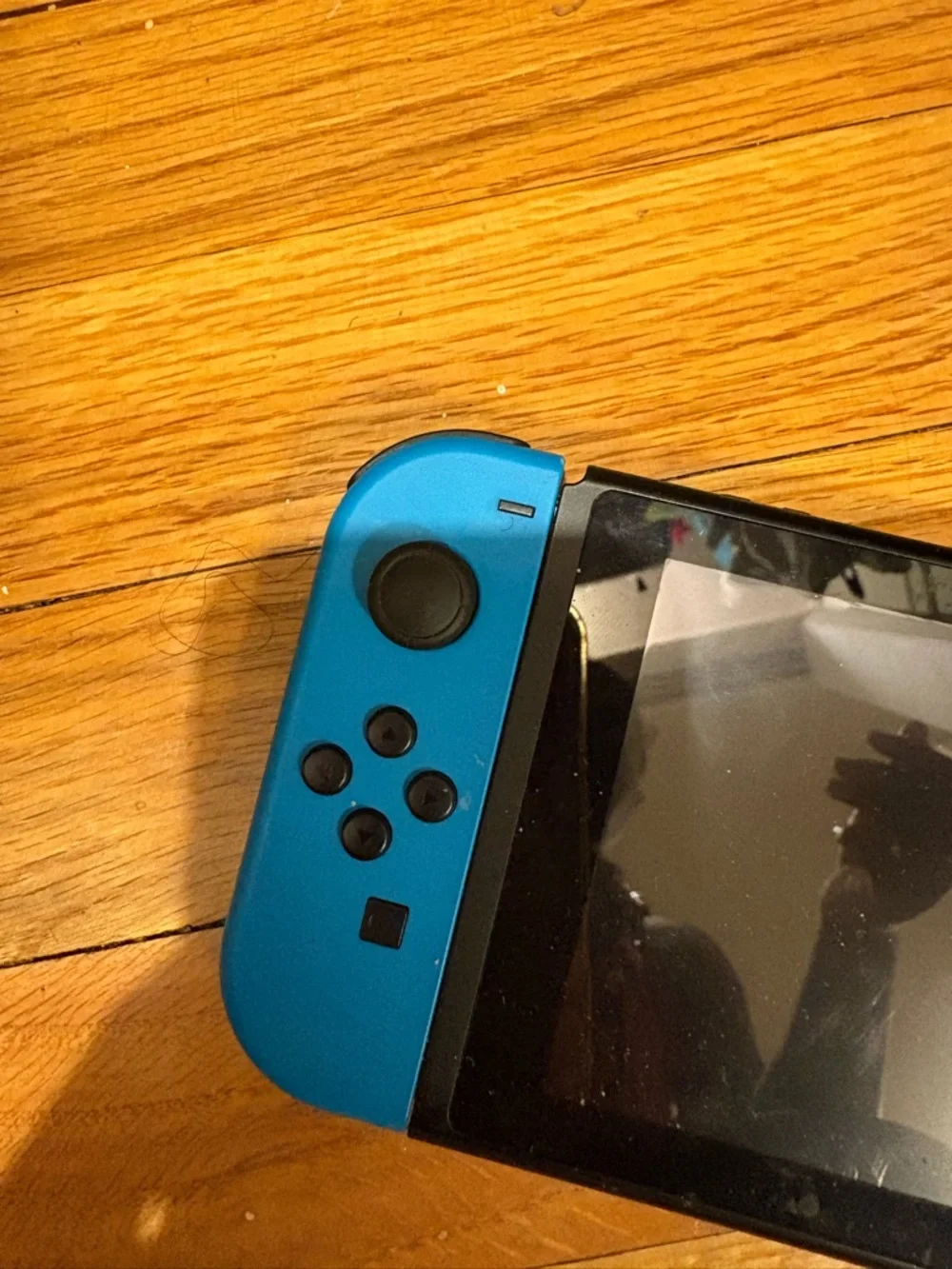 Nintendo Switch with Blue Left and Red Right Joy‑Con